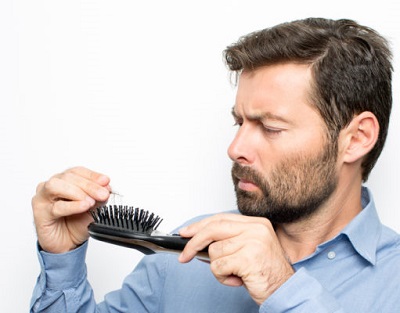 تساقط الشعر للرجال.jpg